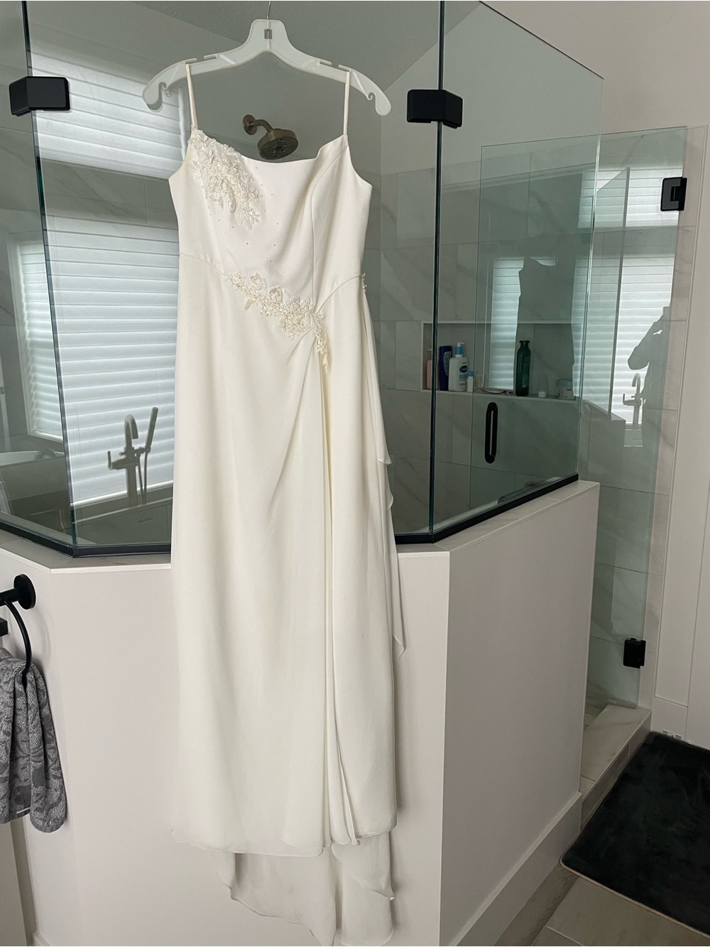 Elegant White Spaghetti-Strap Wedding Dress with Beaded Detail